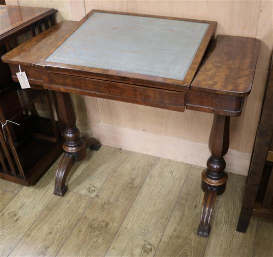A Victorian mahogany writing table, drawer stamped Gillows